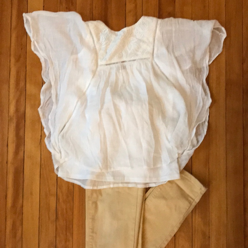 Size 10 mustard jeans with white peasant top.